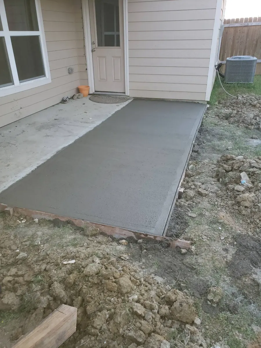 Poured concrete patio extension